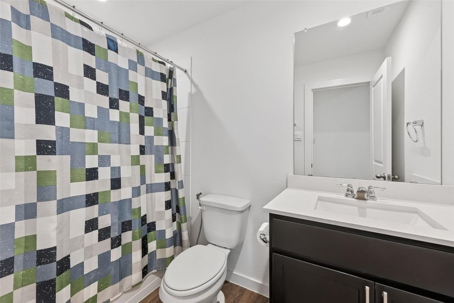 Secondary bathroom #2 featuring a tub/shower combo for added convenience