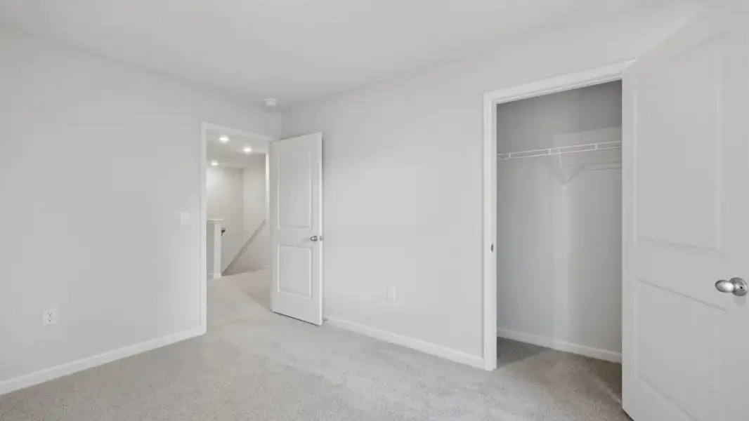 Spacious, unfurnished interior of a new home in Hughes Court, Dawsonville (Image 24).