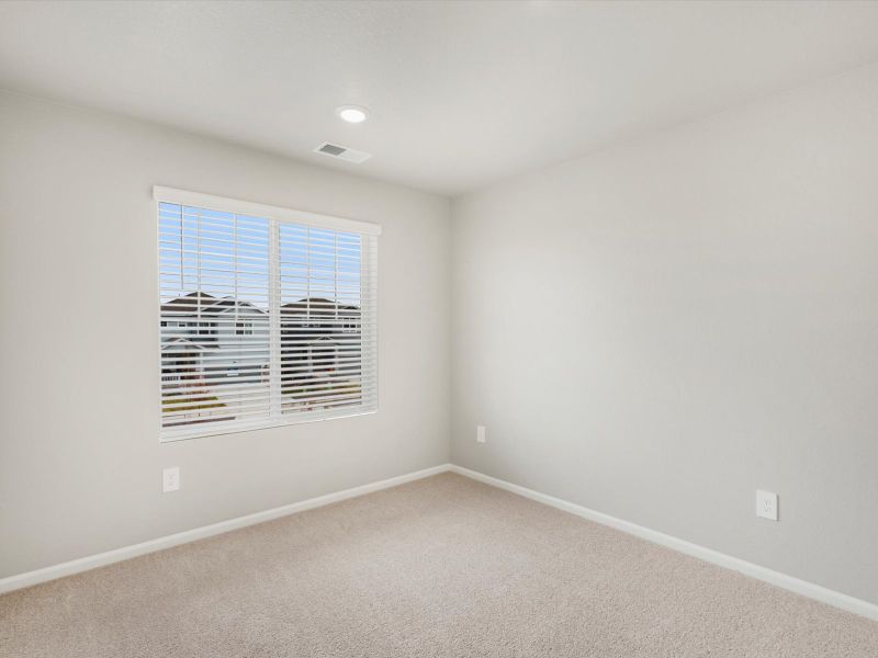 Spacious, unfurnished interior of a new home in Lorson Ranch: The Trail Collection, Colorado Springs (Image 11).