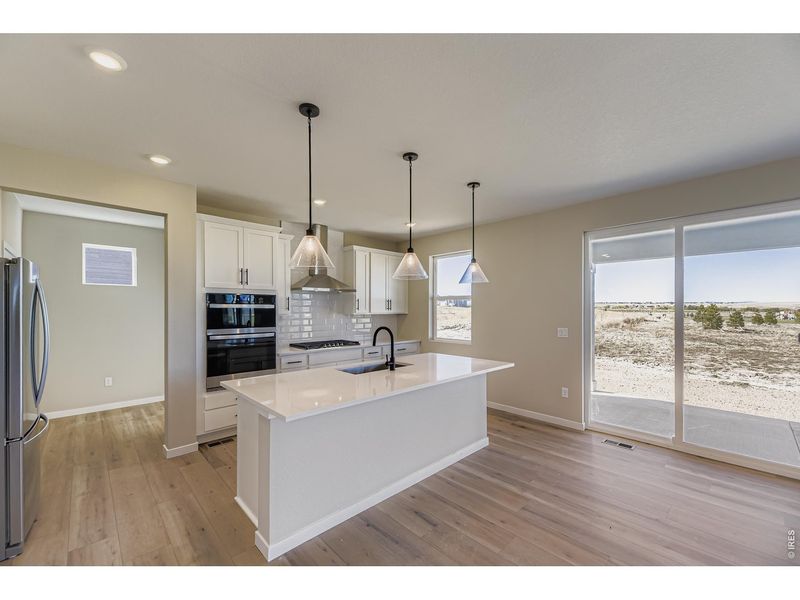 Furnished interior view inside a new home in Farmstead, Berthoud (Image 9).