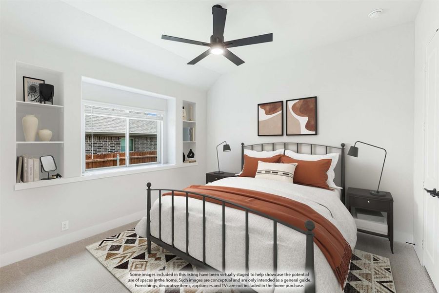 Bedroom with metal bed frame, vaulted ceiling, ceiling fan, and built-in shelves beside a window Bedroom with metal bed frame, vaulted ceiling, ceiling fan, and built-in shelves beside a window