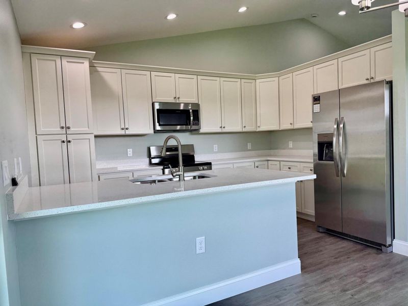 Furnished interior view inside a new home in , Okeechobee (Image 8).