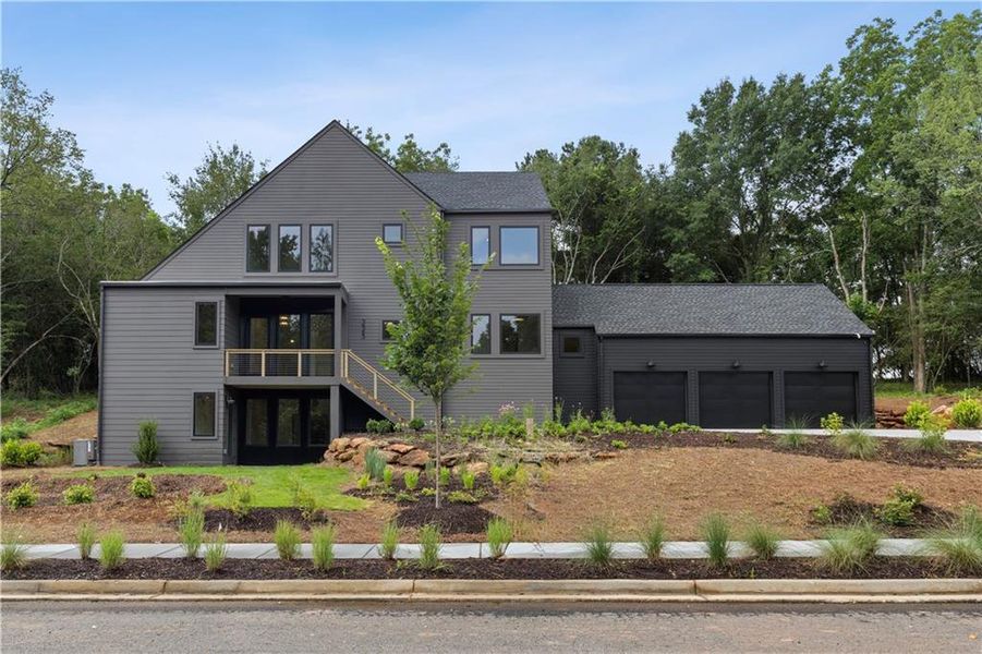 Front exterior of a new home in Aster, Roswell, GA, highlighting curb appeal (Image 1). Front exterior of a new home in Aster, Roswell, GA, highlighting curb appeal (Image 1).