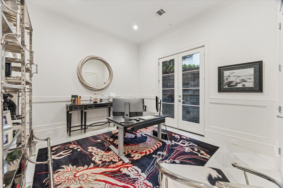 Office or bedroom on the first floor opens to the patio area Office or bedroom on the first floor opens to the patio area