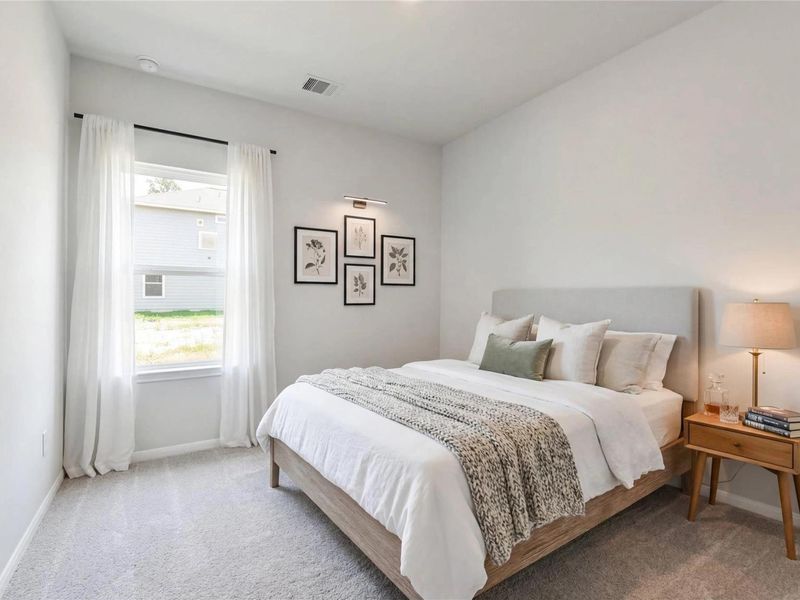 Furnished interior view inside a new home in Caney Creek Place, Conroe (Image 15).
