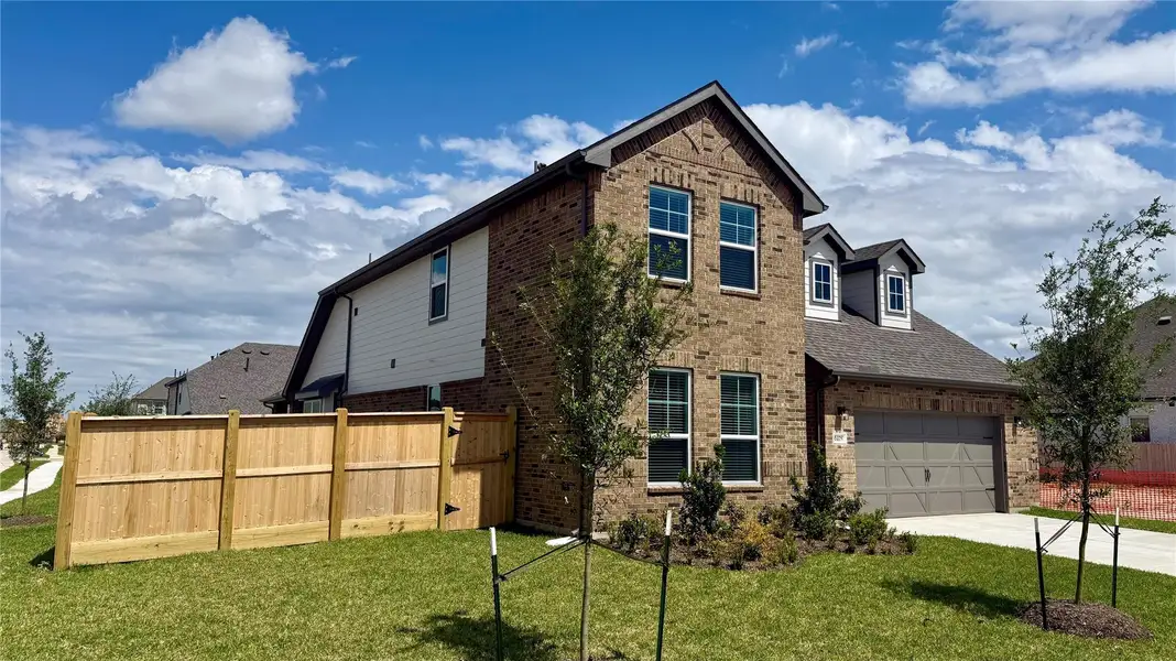 Front exterior of a new home in , Katy, TX, highlighting curb appeal (Image 1). Front exterior of a new home in , Katy, TX, highlighting curb appeal (Image 1).