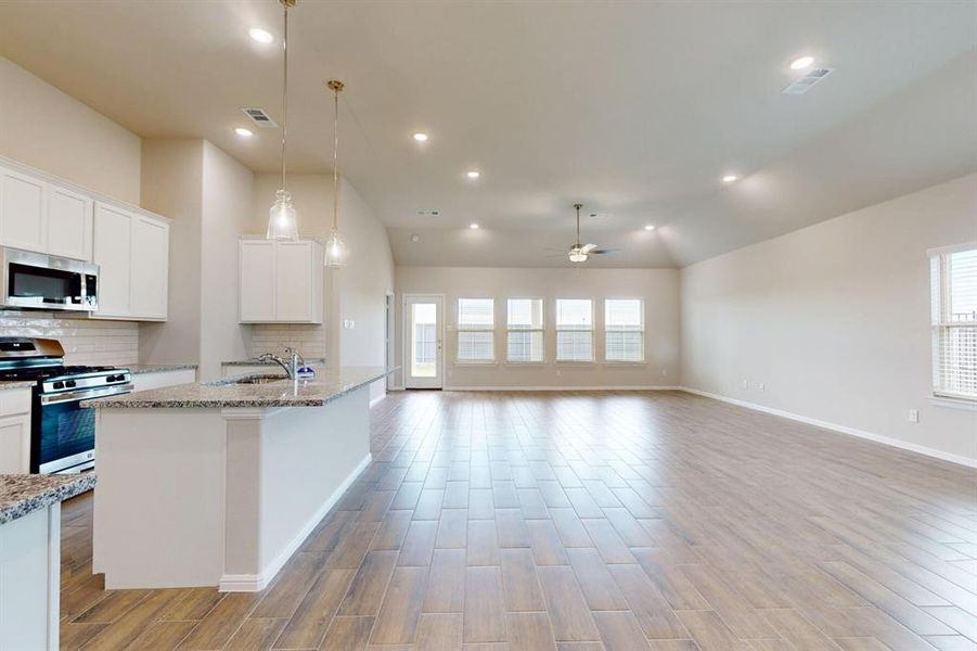 Furnished interior view inside a new home in Prairie Ridge at Goodland, Venus (Image 10).