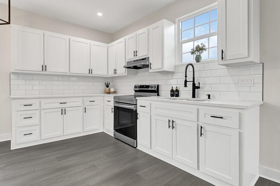 Kitchen with modern and new appliances. Kitchen with modern and new appliances.