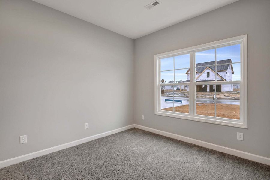 Representative unfurnished interior of a home built from the Garland by Caviness & Cates Communities in Bartlett Manor, Youngsville (Image 240). Representative unfurnished interior of a home built from the Garland by Caviness & Cates Communities in Bartlett Manor, Youngsville (Image 240).
