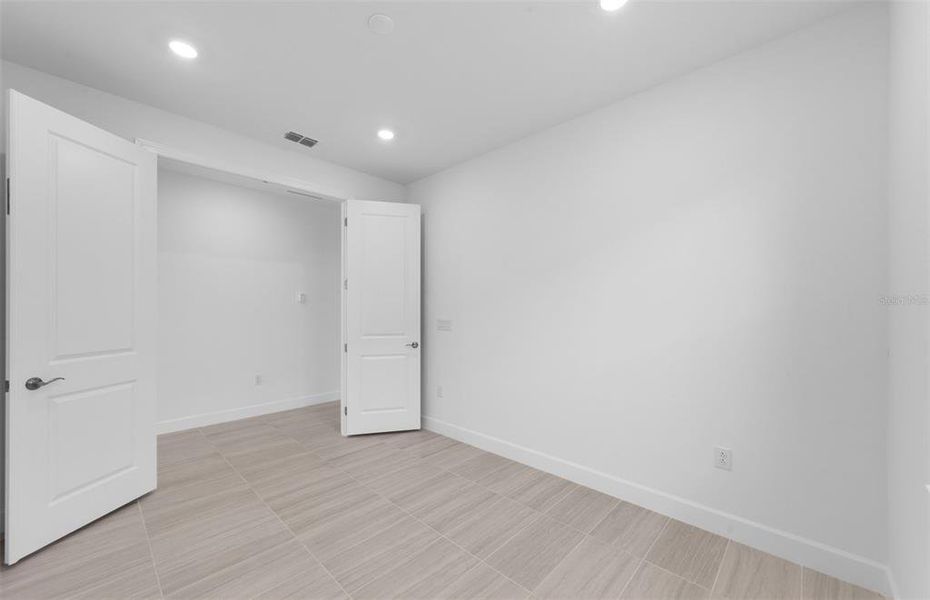 Spacious, unfurnished interior of a new home in BeachWalk by Manasota Key, Englewood (Image 12). Spacious, unfurnished interior of a new home in BeachWalk by Manasota Key, Englewood (Image 12).
