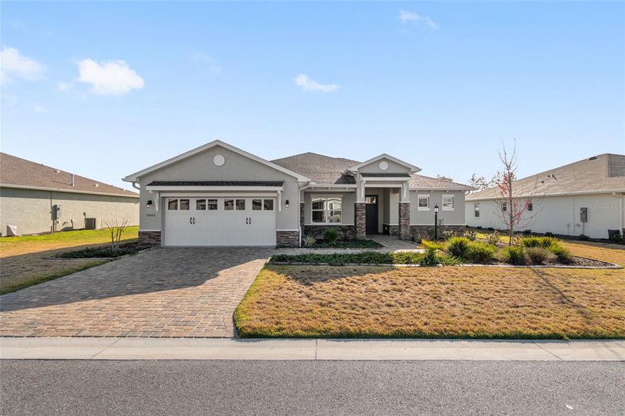 Front exterior of a new home in , Ocala, FL, highlighting curb appeal (Image 26).
