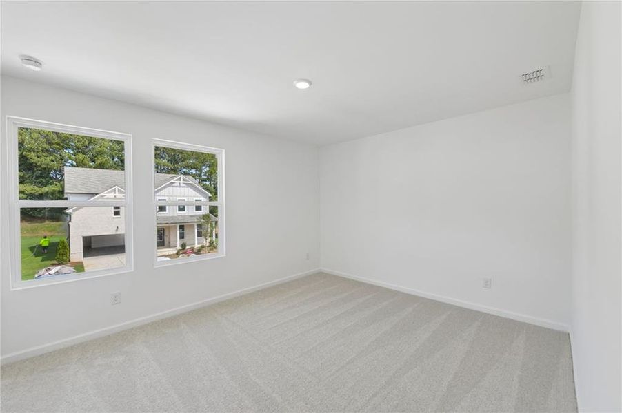 Spacious, unfurnished interior of a new home in Windance Lake, Loganville (Image 29).