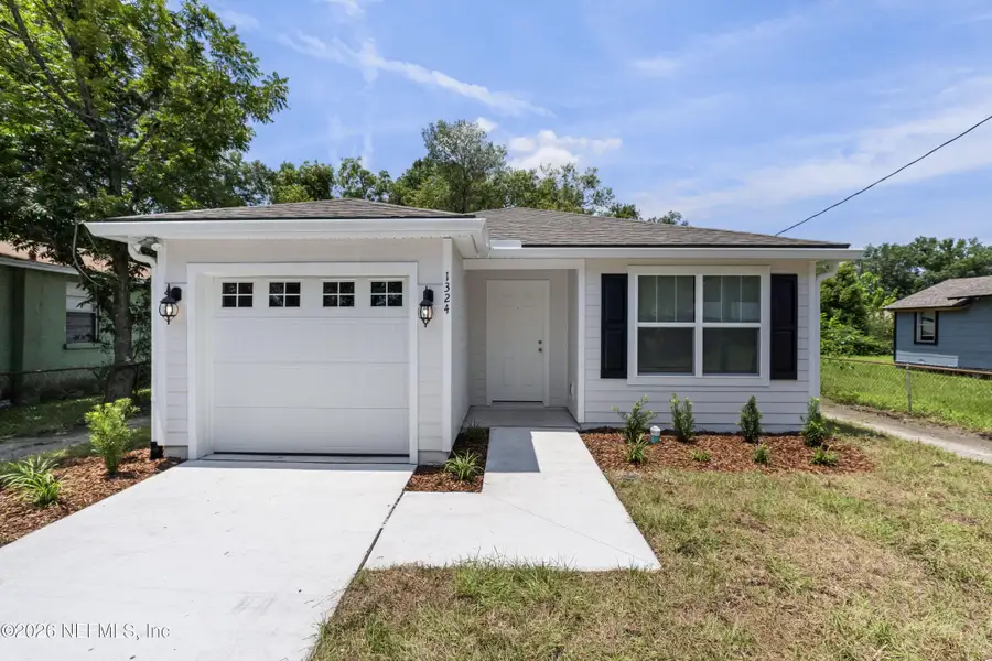 Front exterior of a new home in , Jacksonville, FL, highlighting curb appeal (Image 1). Front exterior of a new home in , Jacksonville, FL, highlighting curb appeal (Image 1).