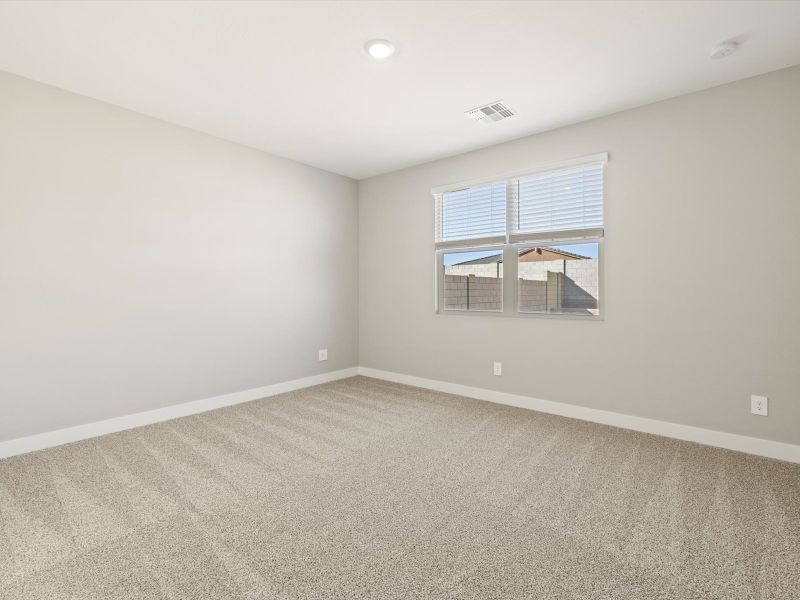 Spacious, unfurnished interior of a new home in White Tank Foothills Reserve Series, Waddell (Image 11).