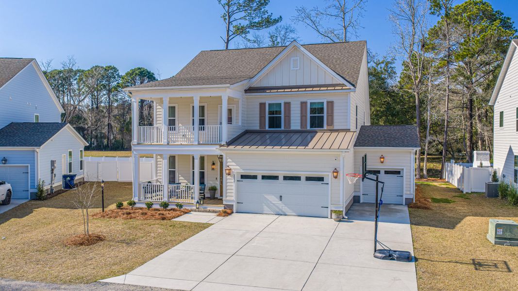 Front exterior of a new home in , Awendaw, SC, highlighting curb appeal (Image 23).