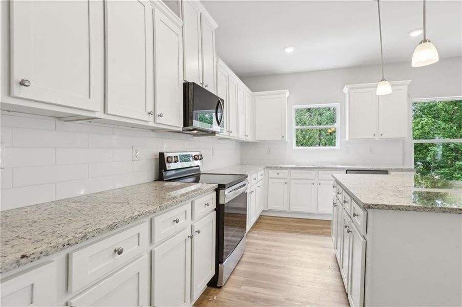 Furnished interior view inside a new home in The Hills at Cedar Creek, Winder (Image 7).