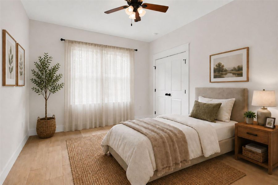 Bedroom #3 with virtual staging facing the front of the home