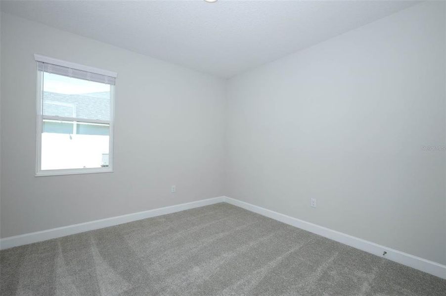 Spacious, unfurnished interior of a new home in Wolf Lake Ranch, Apopka (Image 26).
