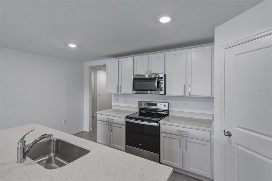 Furnished interior view inside a new home in Berry Bay, Wimauma (Image 14).