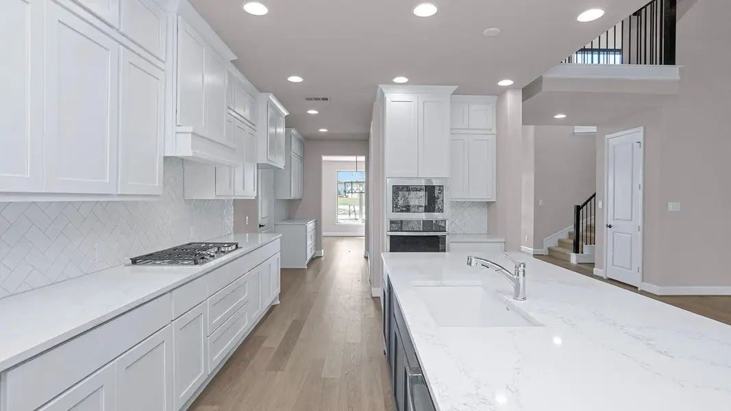 Furnished interior view inside a new home in Evergreen 70', Conroe (Image 9).