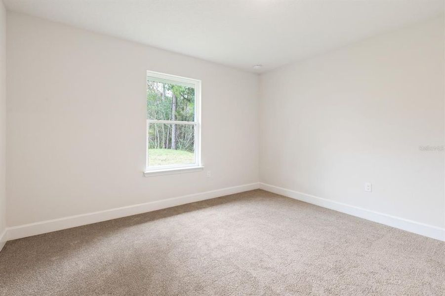 Representative unfurnished interior of a home built from the 1540 by Adams Homes in Okeechobee, Okeechobee (Image 20).