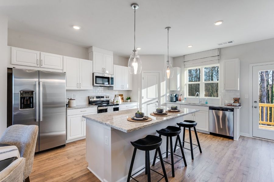 Representative furnished interior of a home built from the Forsyth by Taylor Morrison in Hampton Trace, Marietta (Image 6).