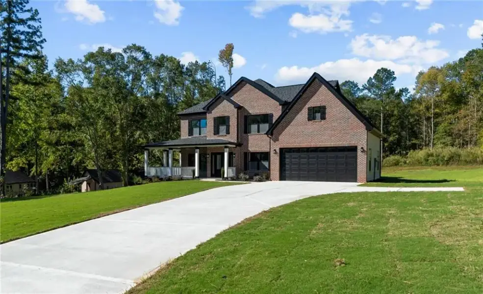 Front exterior of a new home in , McDonough, GA, highlighting curb appeal (Image 20).