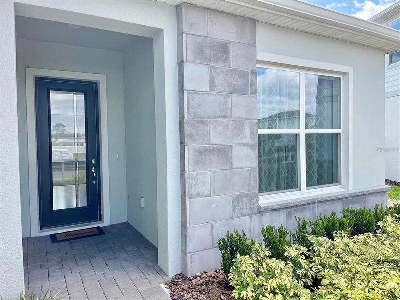 Exterior details and patio area of a home in Parkview Reserve, Orlando (Image 33).