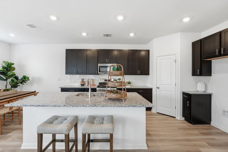 Furnished interior view inside a new home in Longview, Del Valle (Image 3).