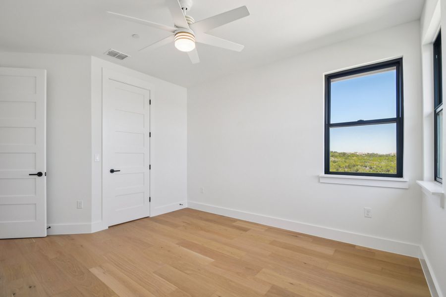 Spacious, unfurnished interior of a new home in Milky Way at River Place, Austin (Image 22).