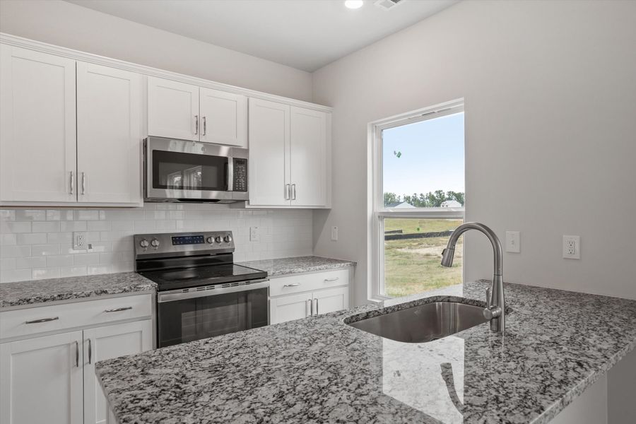 Furnished interior view inside a new home in Cambridge Reserve, Angier (Image 8).