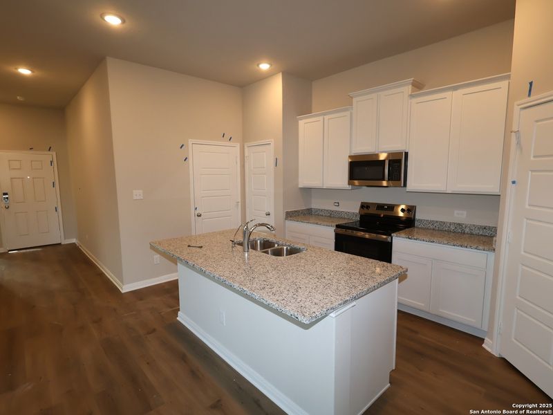 Furnished interior view inside a new home in Greenspoint Heights, Seguin (Image 7).