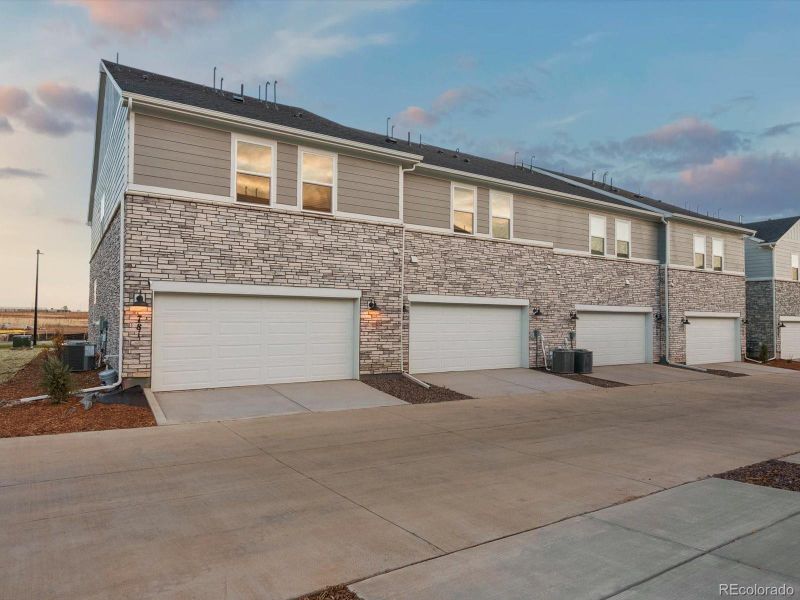 Front exterior of a new home in , Aurora, CO, highlighting curb appeal (Image 2).