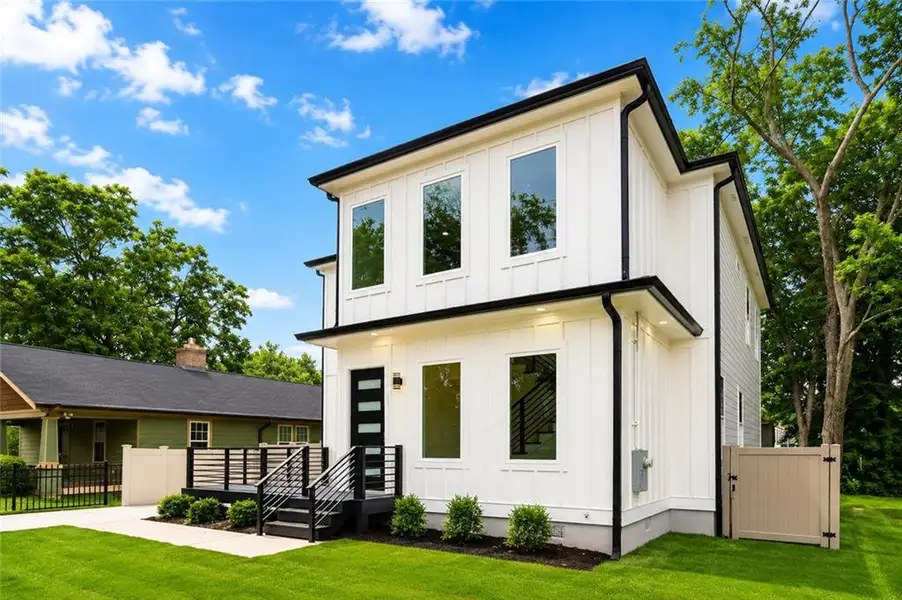 Front exterior of a new home in , Atlanta, GA, highlighting curb appeal (Image 20).