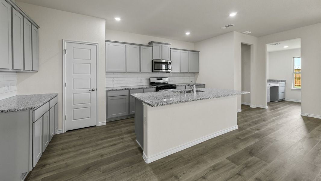 Furnished interior view inside a new home in Liberty Crossing, Royse City (Image 4).
