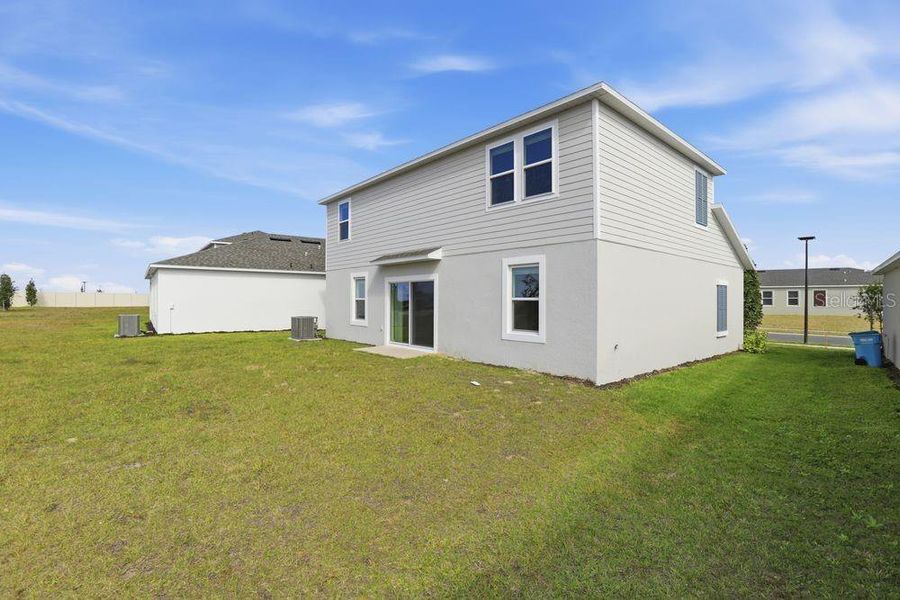 Exterior details and patio area of a home in Waterstone, Groveland (Image 28). Exterior details and patio area of a home in Waterstone, Groveland (Image 28).