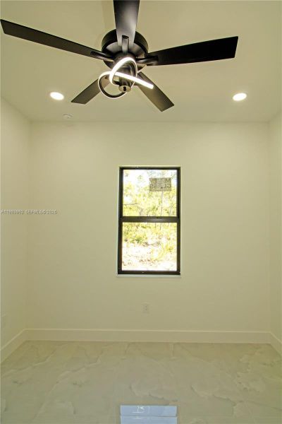 Spacious, unfurnished interior of a new home in , Lehigh Acres (Image 39).
