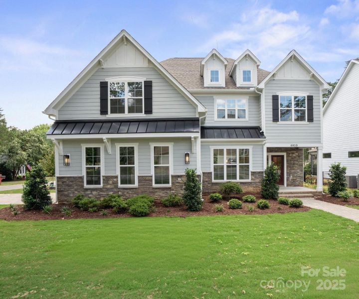 Front exterior of a new home in , Charlotte, NC, highlighting curb appeal (Image 23).