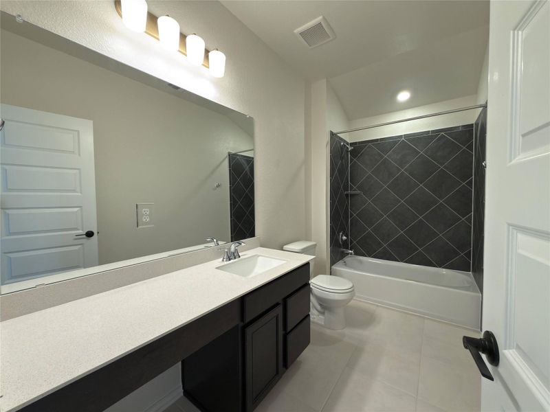 Furnished interior view inside a new home in River Bluff, Leander (Image 7).