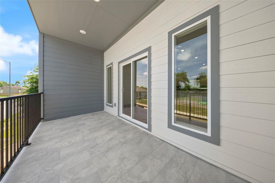 Exterior details and patio area of a home in , Houston (Image 4).
