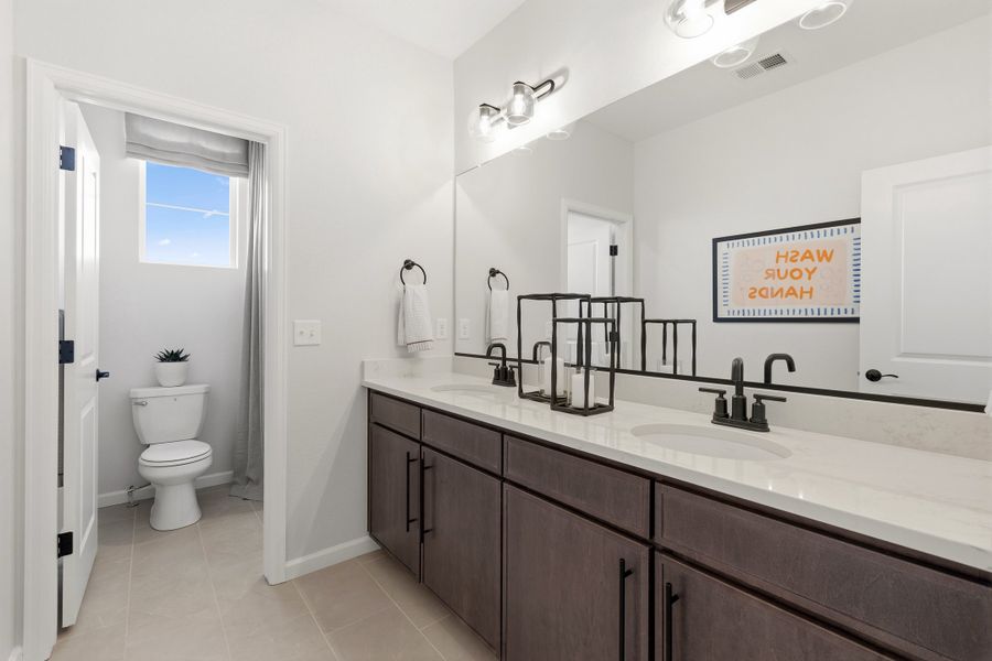 Representative furnished interior of a home built from the 4904 by Risewell Homes in The Aurora Highlands, Aurora (Image 20).