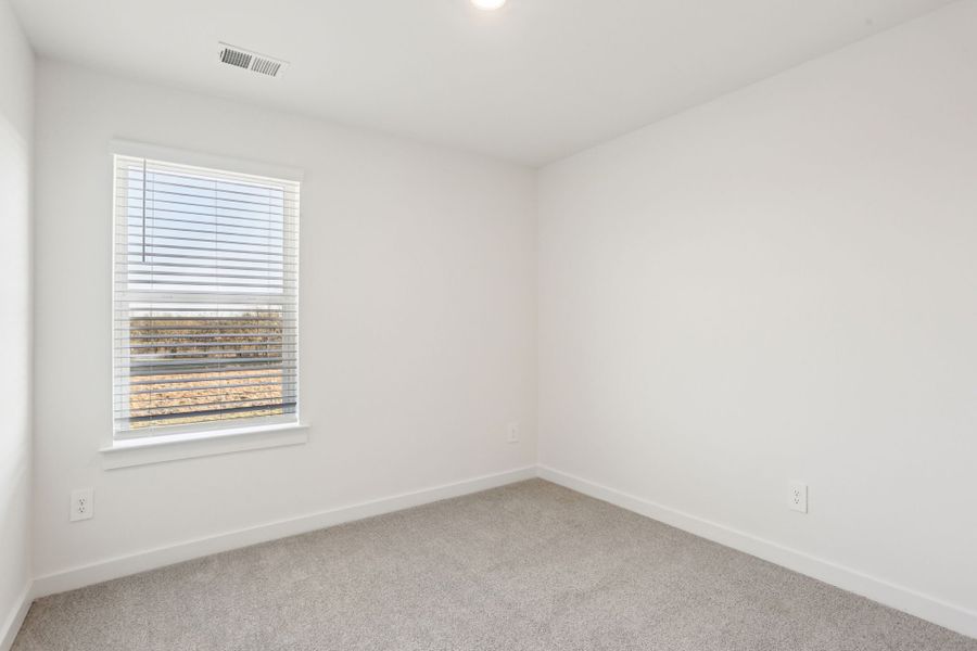 Spacious, unfurnished interior of a new home in Greystone - Highland Townhomes, Smyrna (Image 14).