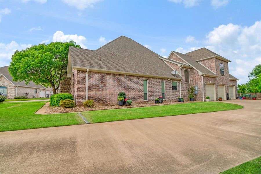 Front exterior of a new home in , Paris, TX, highlighting curb appeal (Image 2). Front exterior of a new home in , Paris, TX, highlighting curb appeal (Image 2).