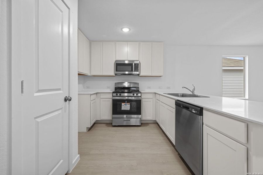Furnished interior view inside a new home in Voss Farms, New Braunfels (Image 7).