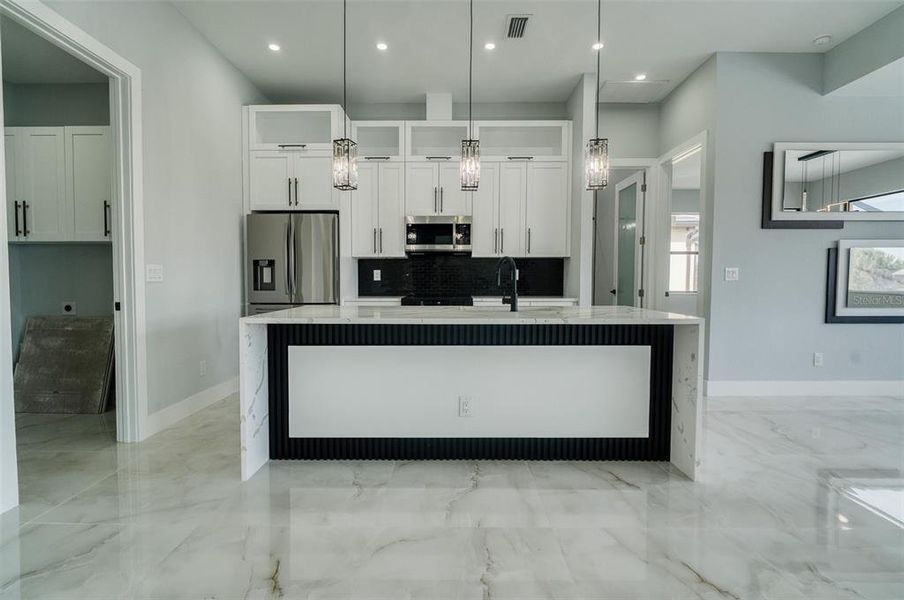Furnished interior view inside a new home in , Port Charlotte (Image 6).
