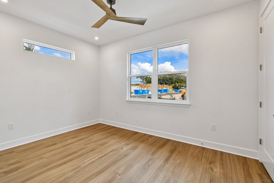 Spacious, unfurnished interior of a new home in EvenTide, New Smyrna Beach (Image 17).