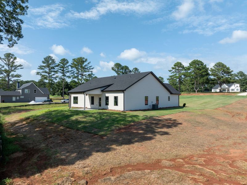 Front exterior of a new home in The Reserve at Reidsboro, Williamson, GA, highlighting curb appeal (Image 25).