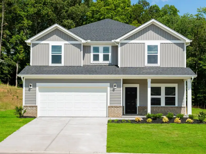 Front exterior of a new home in Holland Park, Spartanburg, SC, highlighting curb appeal (Image 1).