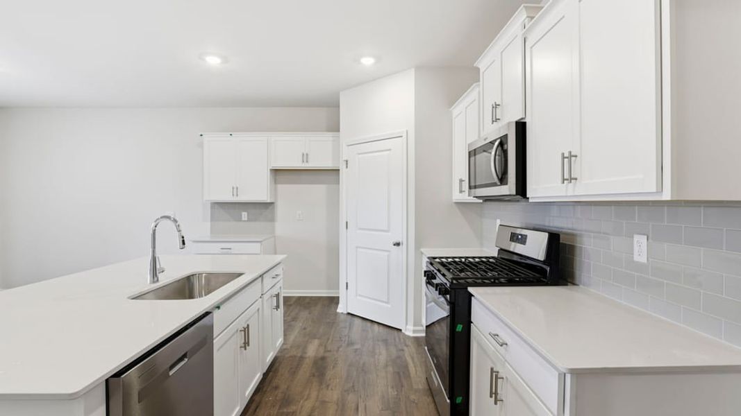 Furnished interior view inside a new home in Waverly Station, Greenwood (Image 5).