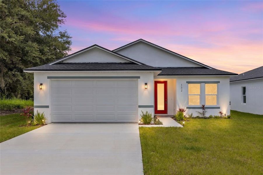 Front exterior of a new home in , Osteen, FL, highlighting curb appeal (Image 18). Front exterior of a new home in , Osteen, FL, highlighting curb appeal (Image 18).